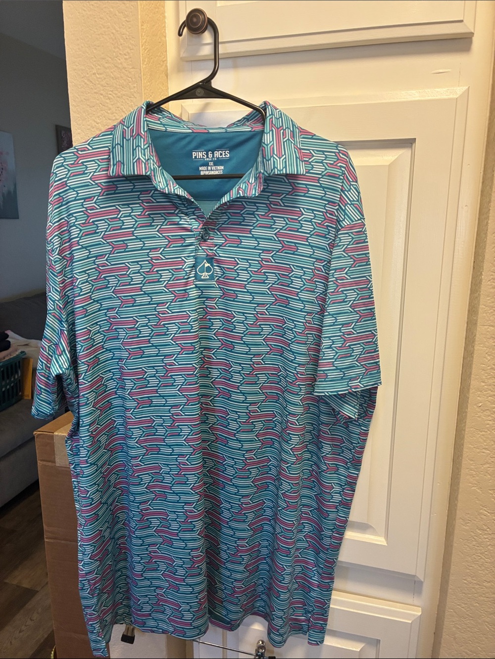 Men’s pins and Aces teal and pink patterned golf Polo Shirt